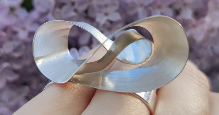 MaGu Smykker Sølvring i form av et infiniti-symbol